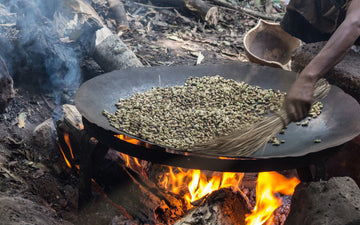 Person roasting coffee outdoors in Ethiopia