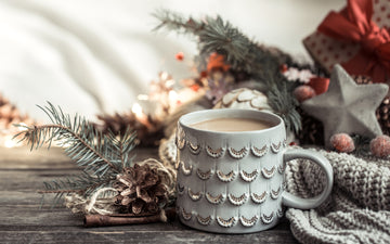 Mug of seasonal flavored coffee with winter flavors